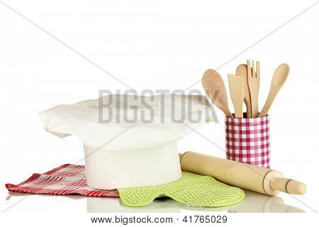 Kochmütze mit Löffel und Federballschläger, isolated on white