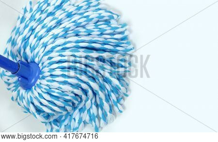 Rope mop in blue. Microfiber mop. House cleaning.     