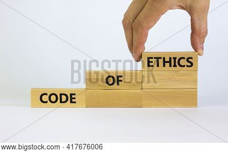 Code Of Ethics Symbol. Concept Words 'code Of Ethics' On Wooden Blocks On A Beautiful White Backgrou
