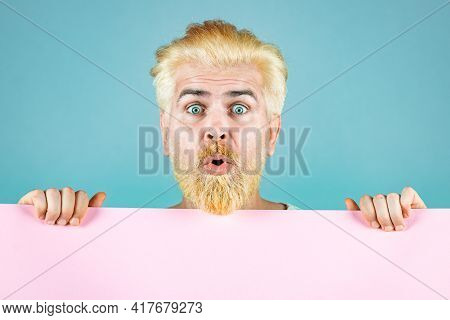 Surprised Blonde Bearded Man Holding Empty Paper. Discount Sale Or Season Sales. Business Man Holdin