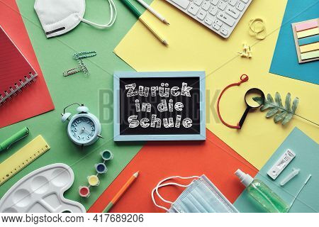 Zuruch In Die Schule Means Or Back To School In German Language. Concept Top View With Chalk Text On