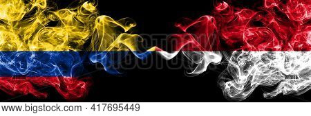 Colombia, Colombian Vs Monaco, Monacan Smoky Mystic Flags Placed Side By Side. Thick Colored Silky A