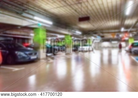 Parking Lot Cars Blurred. Car Lot Parking Space In Underground City Garage. Empty Road Asphalt Backg