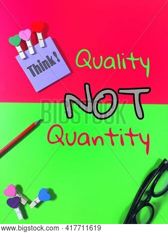 Pencil, Glasses And Note Paper Wording Think! With Love Clamps And Also A Written Quality Not Quanti