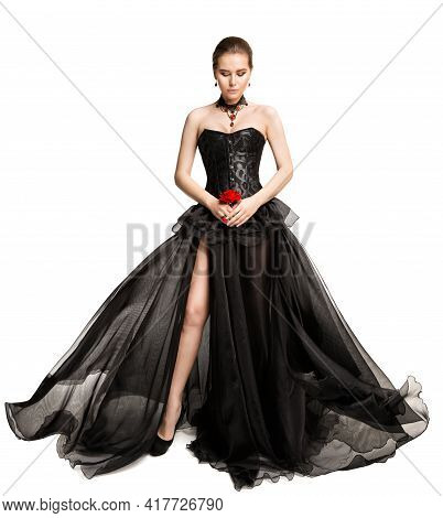 Beautiful Woman In Black Evening Gown Looking Down, Full Length Vintage Fashion Flying Chiffon Dress