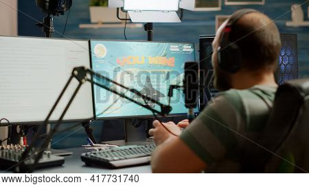 Entusiastic Man Gamer Streamer Wining Space Shooter Video Games