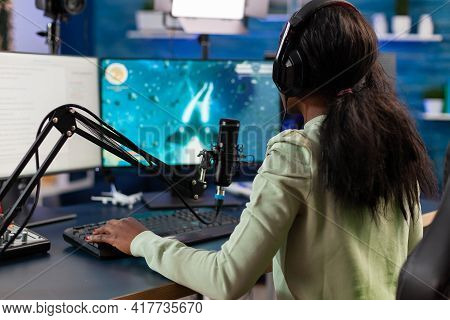 Professional E Sports Afro Gamer Talking On Microhone