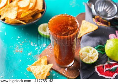 Mexican Alcohol Cocktail Michelada With Dark Beer And Lime Juice