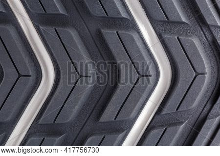 Close-up Full Frame Background Of New Generic Contemporary Sneakers Outsole With Protector Shapes