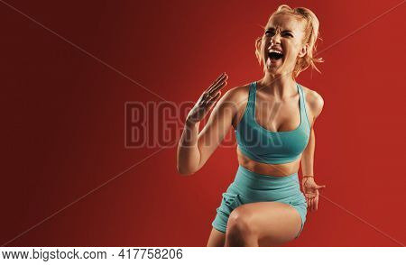 Portrait of sweaty blonde woman take a break after intense workout.