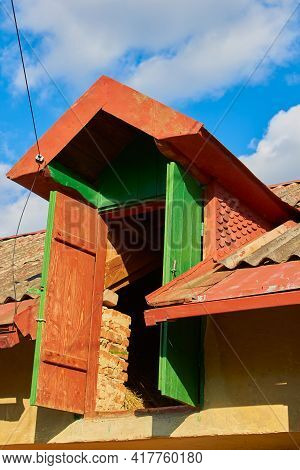 Open Door To The Attic In An Old House For Storing Hay