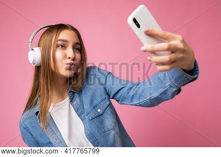 Sexy Attractive Happy Smiling Young Blonde Woman Wearing Blue Jean Stylish Shirt And Casual White T-