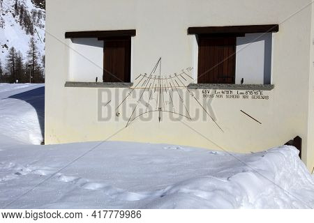 Devero Park ( Verbano-cusio-ossola ), Italy - January 15, 2017: A Sundial On A Wall House In Alpe De