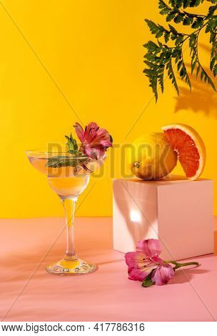 Hard Seltzer Cocktail With Berry Flavors Garnished With Alstroemeria Flower. Refreshing Colorful Sum