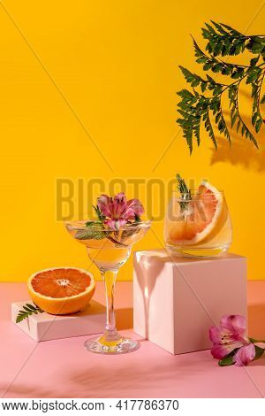 Hard Seltzer Cocktails With Berry Flavors Garnished With Alstroemeria Flower. Refreshing Colorful Su