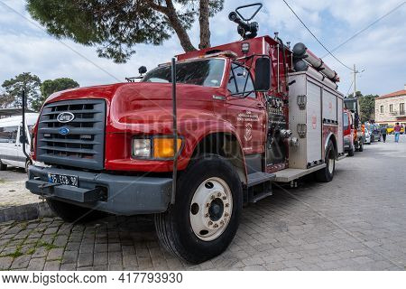 Seferihisar, Izmir, Turkey - 03.09.2021: Front View Of Red Modern Fire Brigade Truck Parked In Front