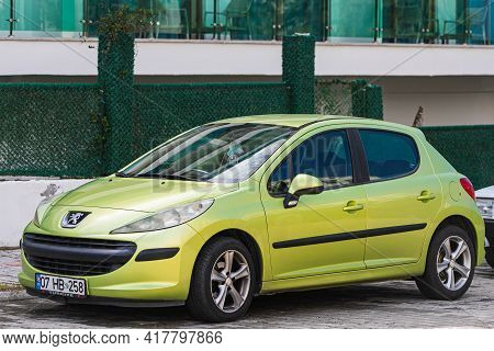 Alanya, Turkey - April 12 2021: Green Peugeot 208  Is Parked  On The Street On A Warm Summer Day Aga