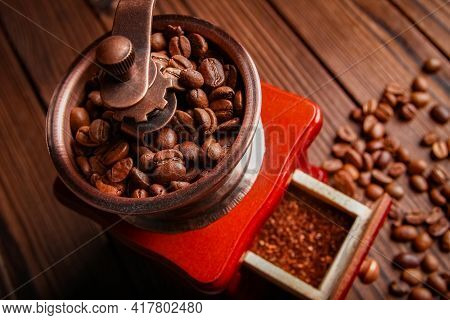 A Coffee Grinder And Coffee A Background