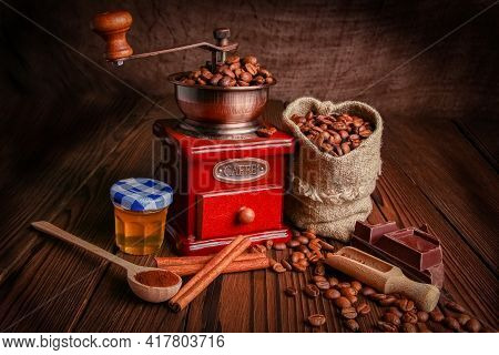 A Coffee Grinder And Coffee Background A