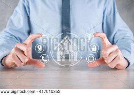 Businessman Hold House Icon.smart Home Controlled, Intelligent House, And Home Automation App Concep