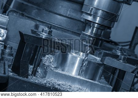 The Operation Of Nc Milling Machine Plunge Cutting The Metal Parts By Flat End Mill Type. The Shop F