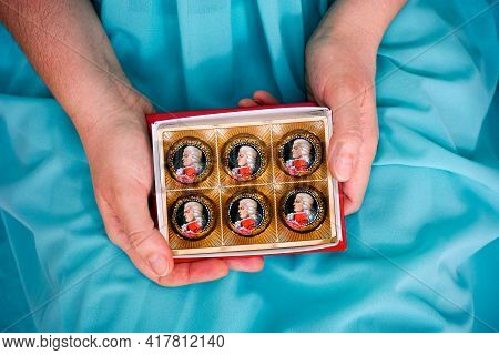 Tambov, Russian Federation - February 14, 2020 Woman Hands Holding Open Box Of Mozart Candies. Turqu