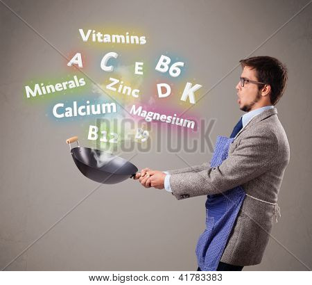 Handsome man cuisson de vitamines et de minéraux