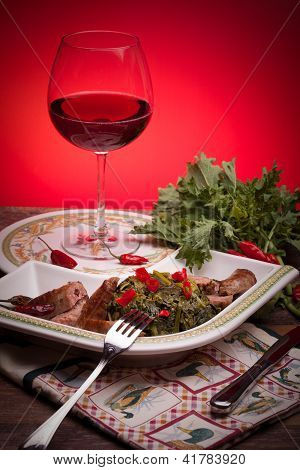 Broccoli Rabe con salsicce e vino rosso