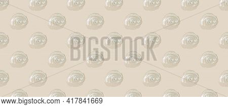 Abstract Cosmetic Banner Background From Drops Of Transparent Gel Or Antiseptic, Hyaluron. Creative 