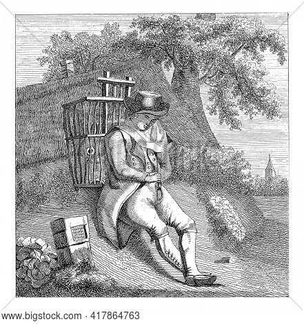 A pedlar sits against a hill with his basket on his back. On the left a pole, on the right a church tower.