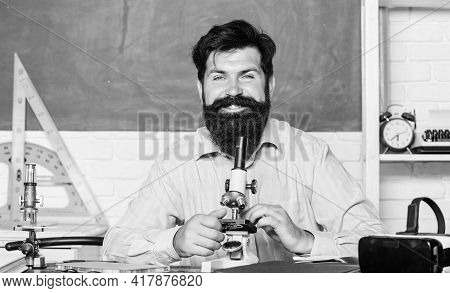 Bearded Man Teacher. Back To School. Science Experiments With Microscope In Lab. Biology Education. 