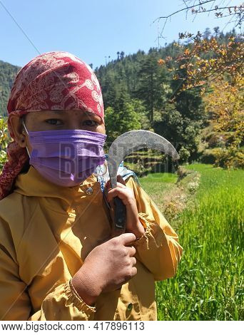 Close-up Of A Indian Young Woman Who Wearing Dhatu (himachal Fashion Accessory) And Face Mask, A Asi