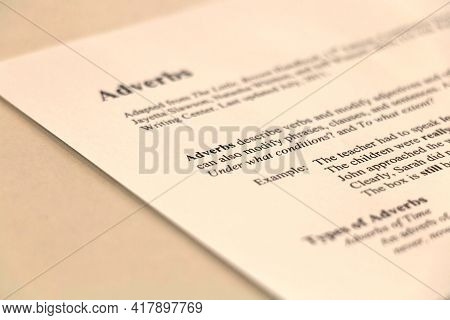Nakhon Ratchasima, Thailand- April 15, 2021: Discription Of Adverb English Grammar On Paper On Table