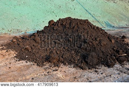 Stabilization Of Slopes By Hydro Sowing. A Mixture Of Wood Pulp And Green Grass Seed Is Sprayed From