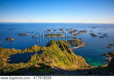 Village Of Henningsvaer Seen From Mount Festvagtinden On Lofoten Islands, Norway