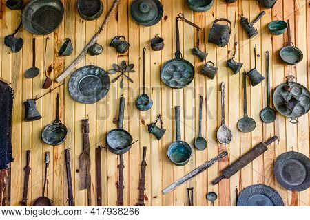 Ancient Kitchen Utensil Hanging On Wall. Kitchenware Of Yoruk Tribe