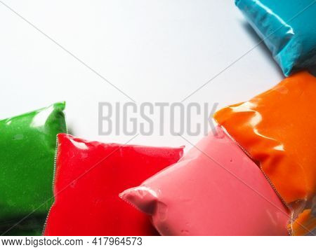 Colorful Kid's Plasticine On White Background, Colorful Dough Modeling Clay. Packing Of Colored Soft