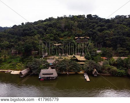 Aerial Panorama View Of Amazon Tropical Rainforest Exotic Lush Jungle Eco Lodge Hotel Wooden Cabin S