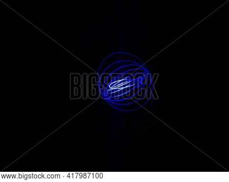 Closeup Of Spirograph Geometric Abstract Pattern Isolated On A Black Background. Long Exposure. Geom