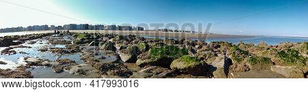 Panoramic View From Breakwater In Sint-idesbald In Koksijde To The Sand And The Appartements On A Su