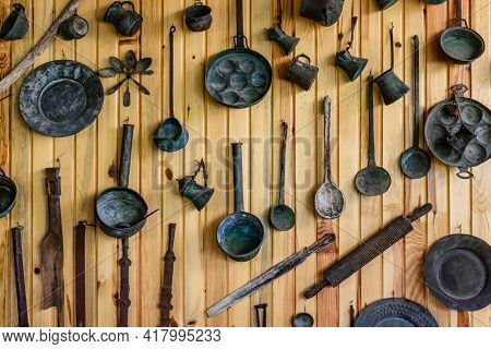 Ancient Kitchen Utensil Hanging On Wall. Kitchenware Of Yoruk Tribe