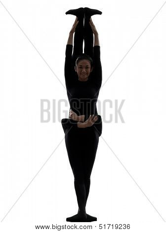 two women contortionist practicing gymnastic yoga in silhouette   on white background