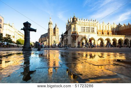 KRAKOW, POLAND - SEPTEMBER 8: View of the Main Square, September 8, 2013 in Krakow, Poland. It dates to the 13th century, and at roughly 40,000 m Ã?ÃÂ¢?? it is the largest medieval town square in Europe.