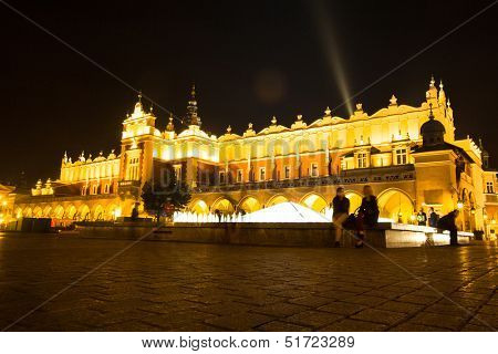 KRAKOW, POLAND - SEP 28: View of Main Market Square (Rynek) with the Renaissance Drapers' Hall (Sukiennice), Sep 28, 2013 in Krakow, Poland. Square dates to the 13th century, and at roughly 40,000 m.