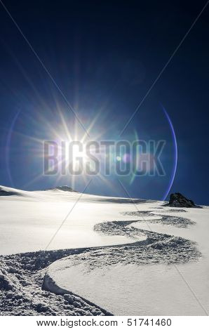 Snow Track Goes Downhill