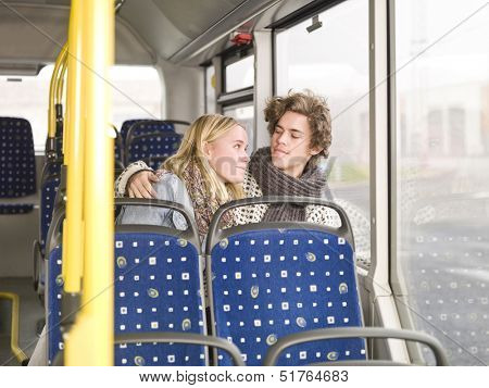 Young couple alone on the bus