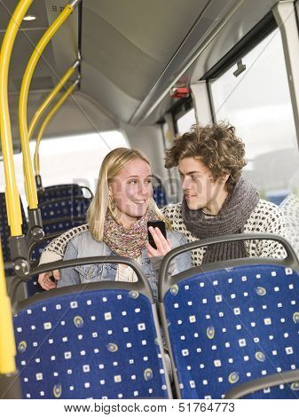 Young couple alone on the bus