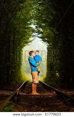 Father And Son Together In Railway Green Tonel