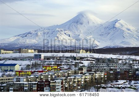 City Petropavlovsk-kamchatsky Against The Background Of Avacha Volcano.