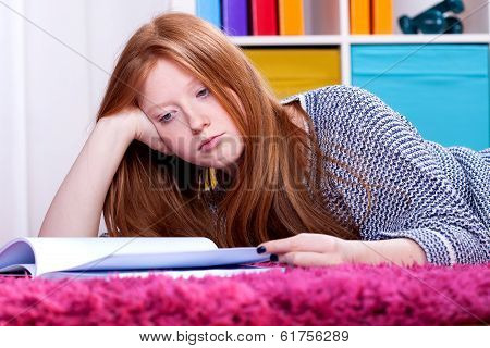 Girl Lying And Studying